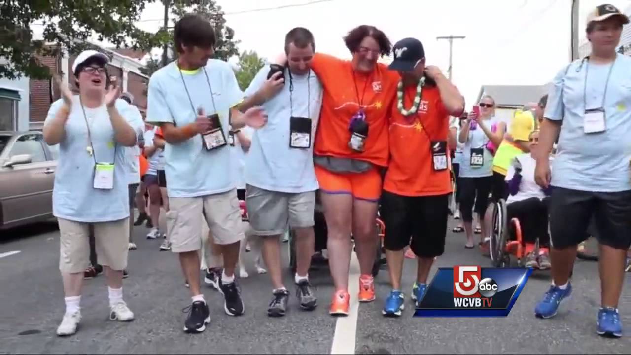 Friends help MS patient walk across MS Walk finish line