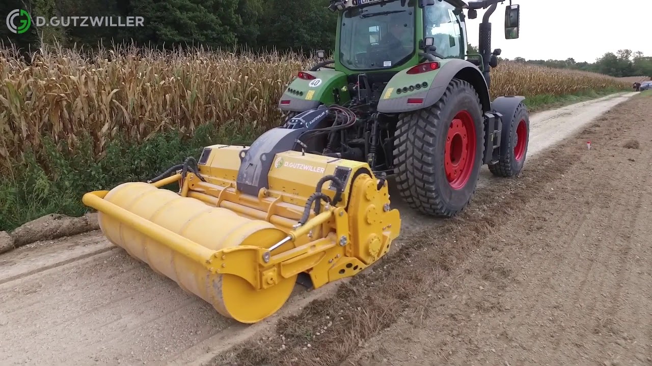 MeriRoad RC-6221 DTG + other road maintenance equipment preparing farm road.