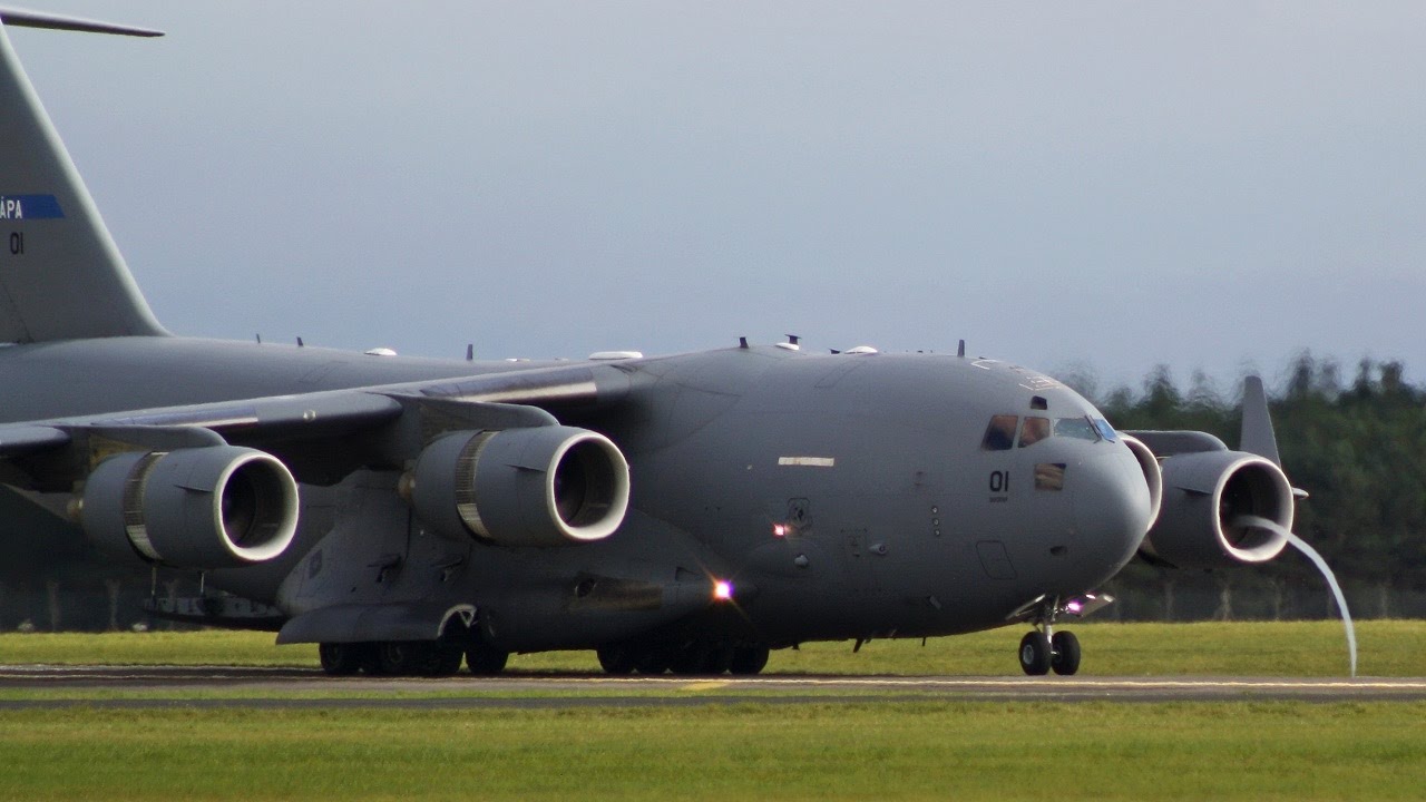 NATO Boeing C-17A lands then Reverses onto stand at RAF Leeming