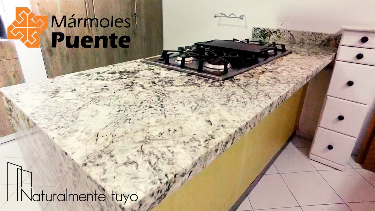 Instalación de cocina. Granito blanco antico