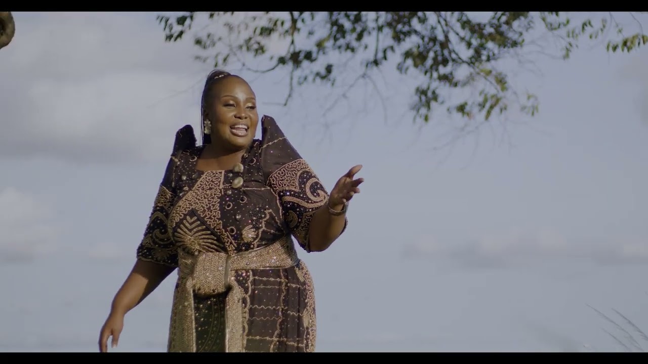 OLI KATONDA by Marylove is a praising  song audio by Enobeat and filmed by Director J-Lucid 