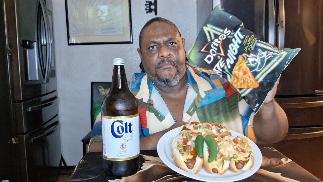 4 Chili Cheese hot dogs with a big bag of Doriros ZESTY JALAPENO POPPER FLAVOR The police stopped me
