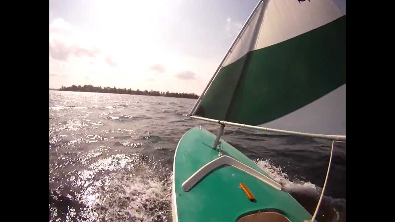 Sailing around Higgins Lake, Michigan in a Sunfish sailboat