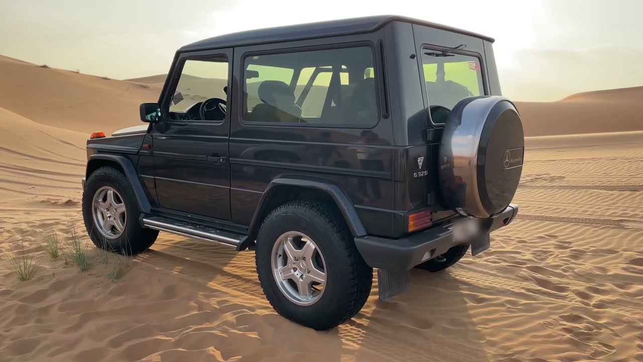 Mercedes g class coupe in the  liwa desert