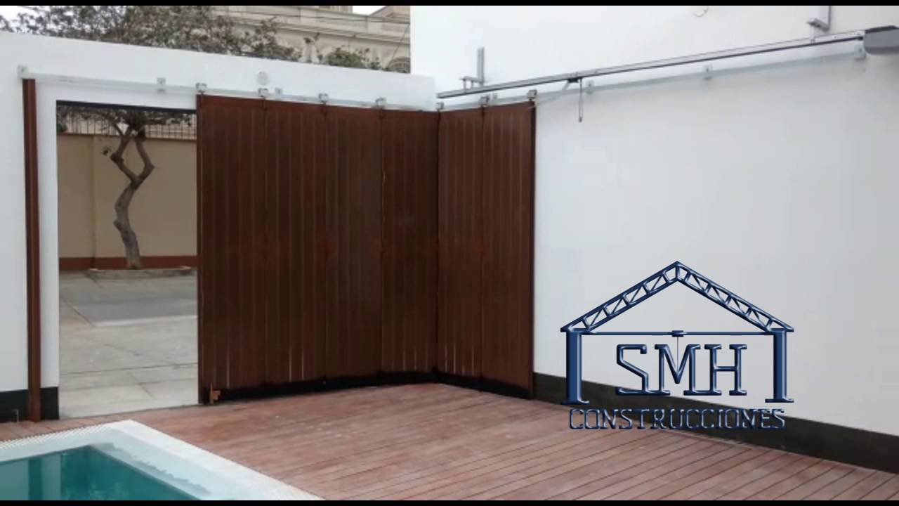 Puerta  seccional lateral GRUPO ALTOS - WhatsApp 983570385