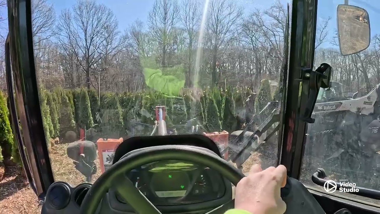 Moving trees with my kubota wheel loader￼￼