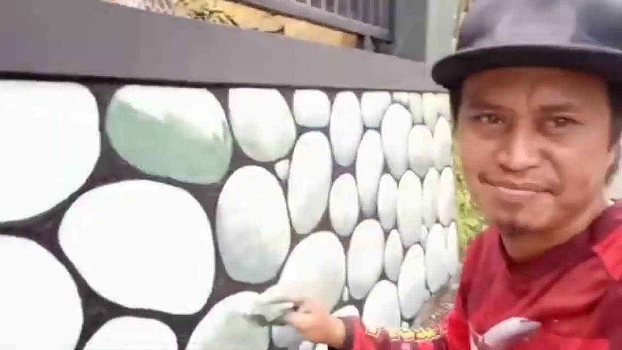Melukis mural konsep batu kali di pagar rumah woooww @jamburitattoo5625 #mural