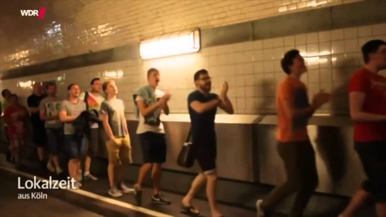 Fernsehbericht &uuml;ber das Spontankonzert des K&ouml;lner Jugendchores St. Stephan im Hamburger Elbtunnel