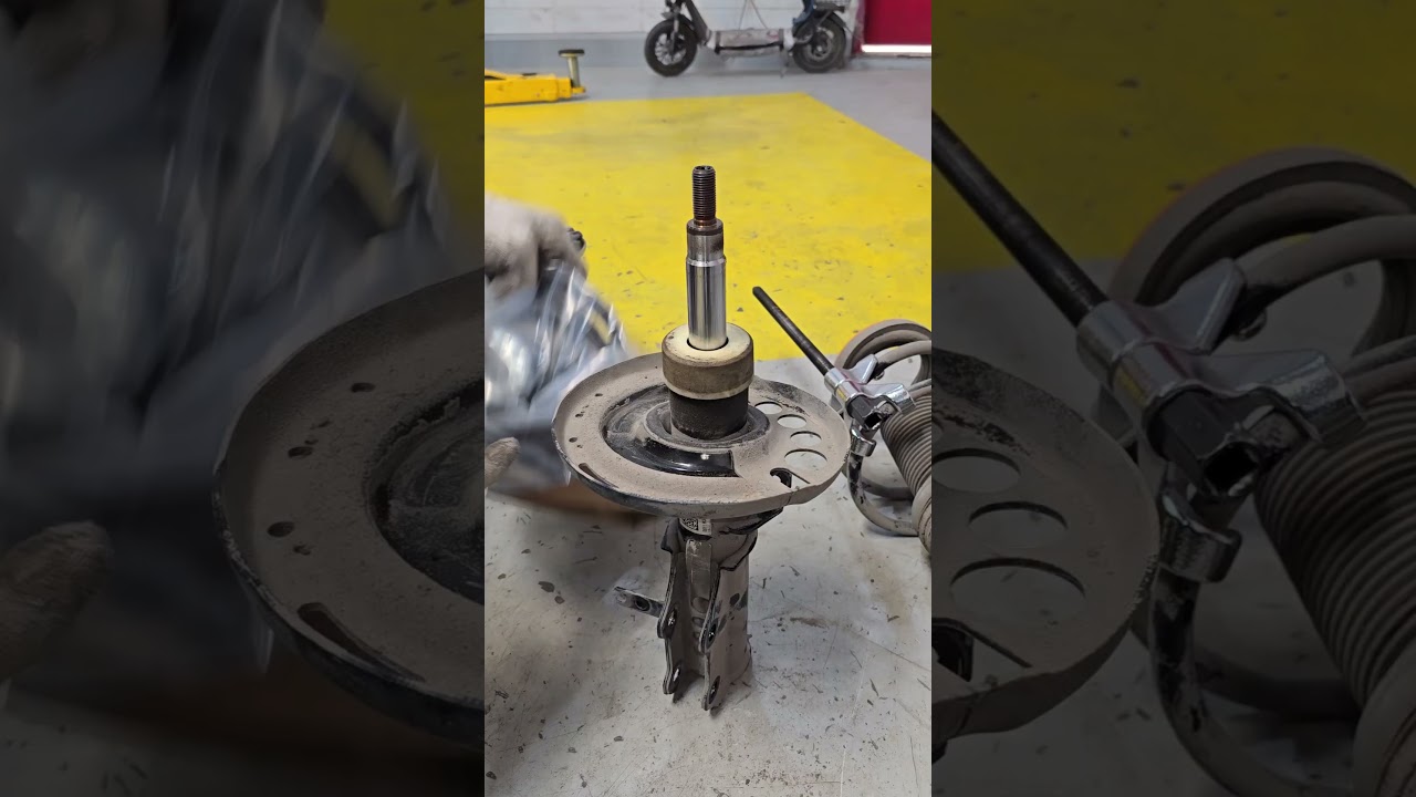 Malibu front shock changing #automotive #DIY #garage #mechanic #trick