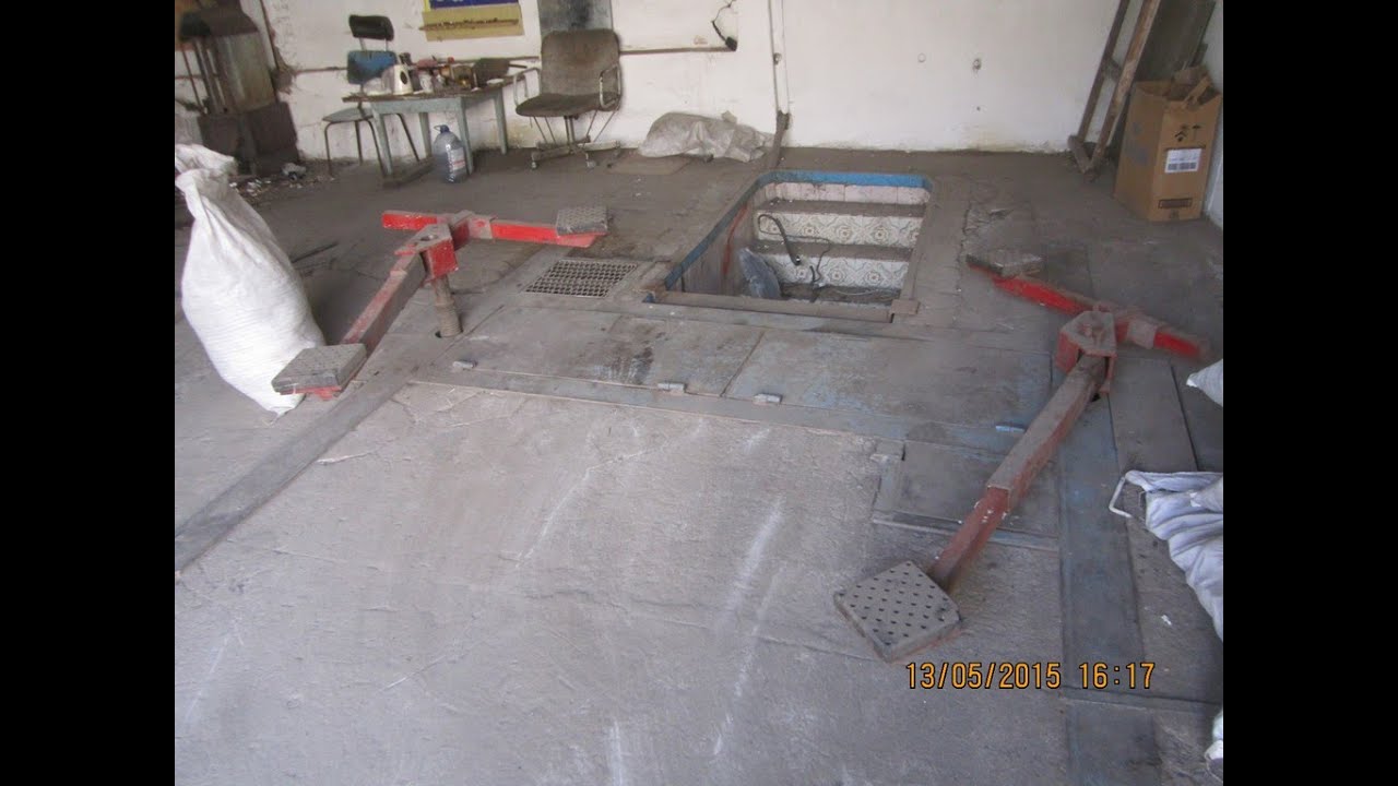 самодельный гаражный автоподъемник.