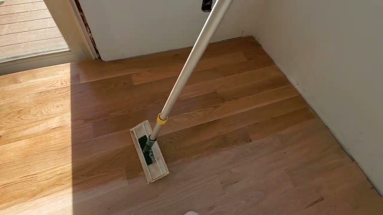 Water popping technique for wood floor staining (dark colors)