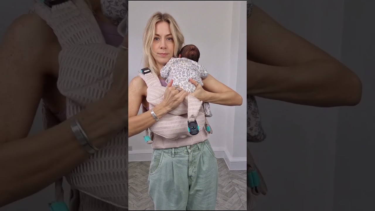 Najell Rise baby carrier! Excuse the baby-related wet patch on my jeans & the wonky left leg 😄