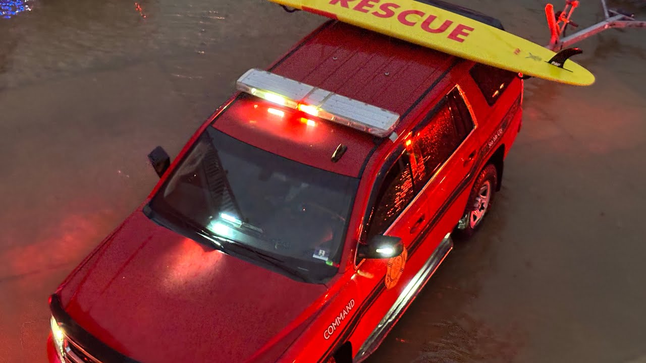Flooding after Hurricane Erin, Sea Isle City, NJ.    Rescue of teenagers 