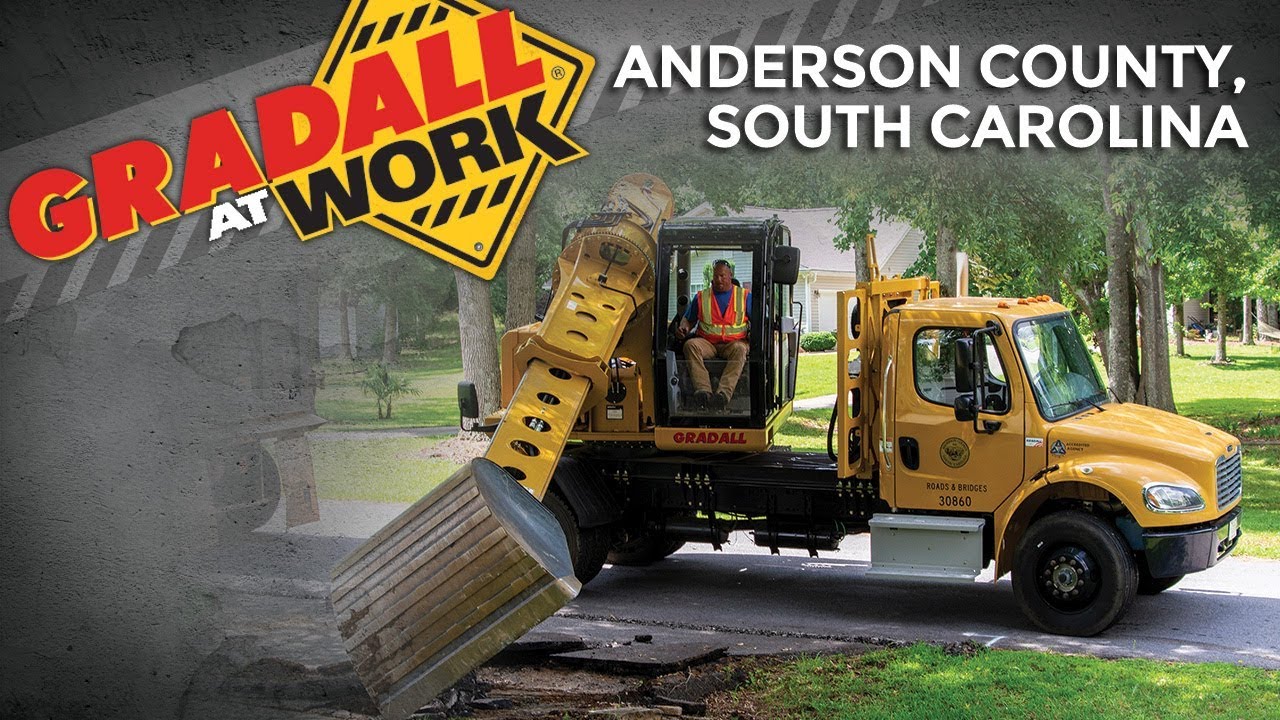 All in a day's work ... wheeled excavator clears beaver dam, replaces driveways, and opens drainage.