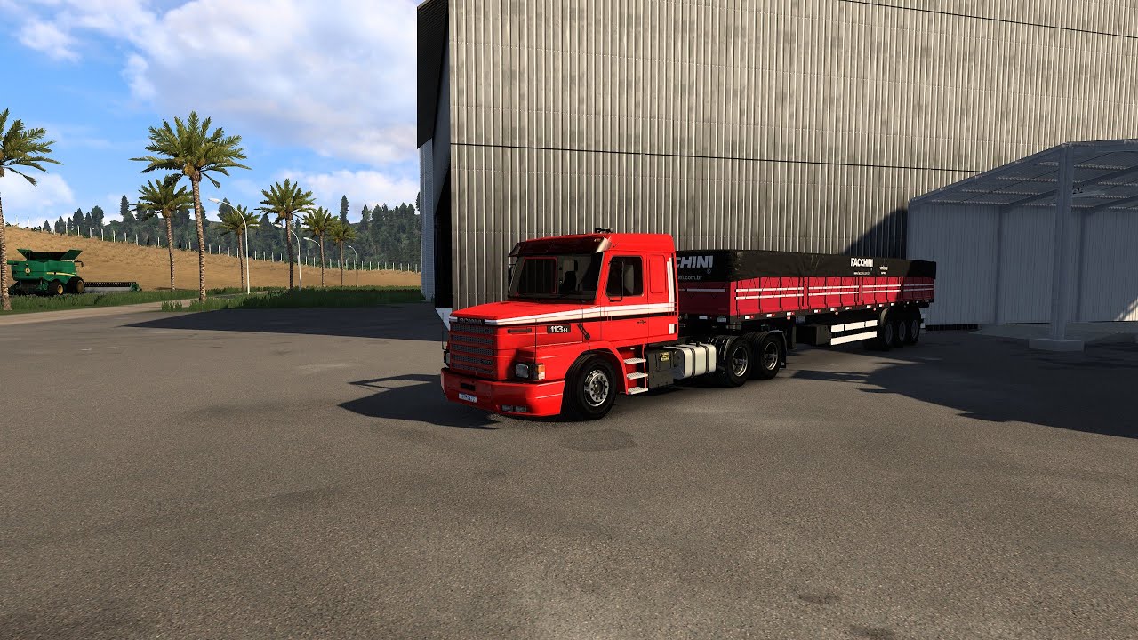 Scania 113 passando sufoco no transporte de soja