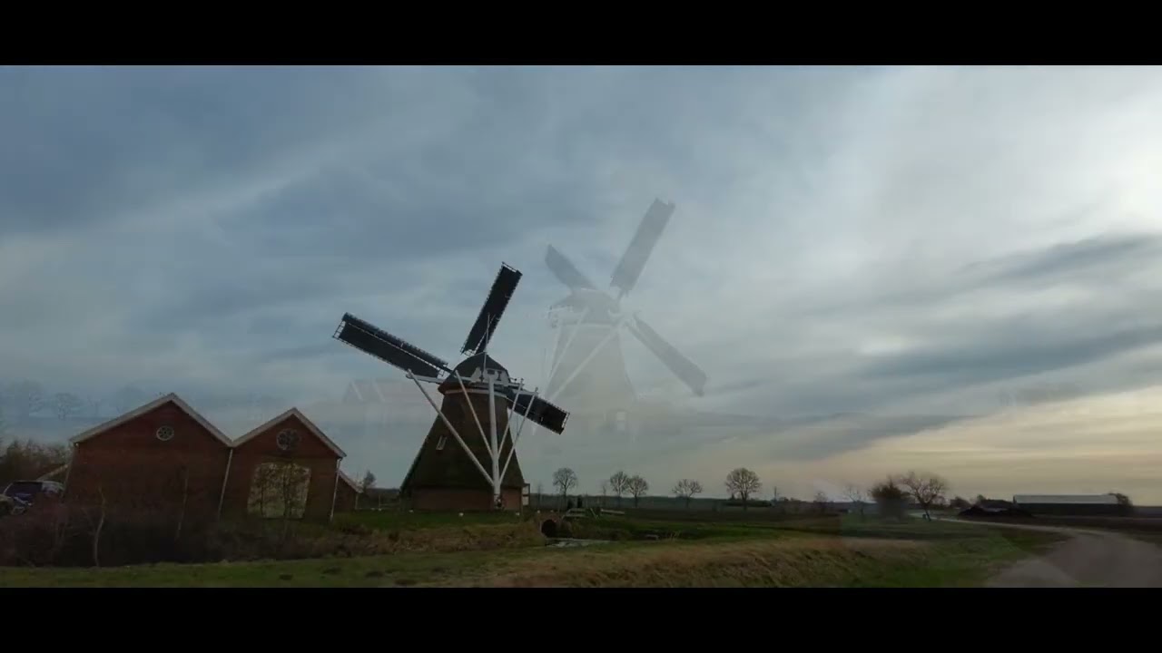 Lente op de Noordermolen en molen van de Groote Polder