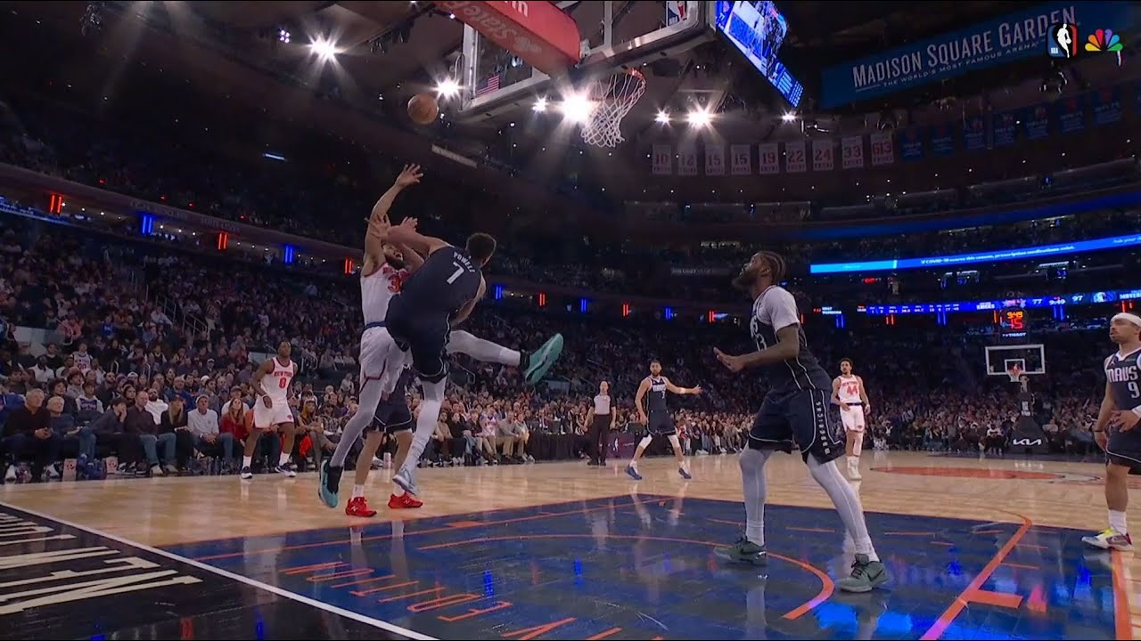 Karl-Anthony Towns knees Dwight Powell in his nuts, which causes Powell to kick KAT in his nuts