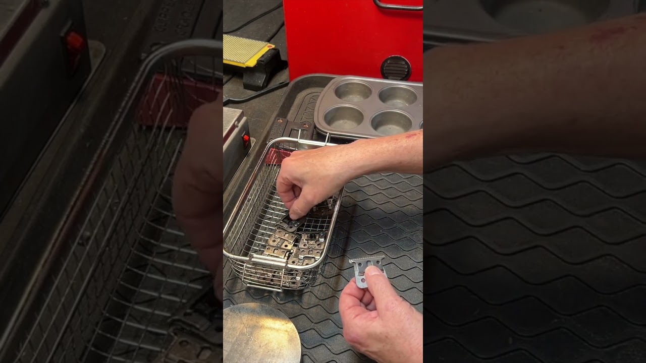 Sharpening Andis T-Liner Trimmer Blades on a Nebraska Blades Big Red Sharpening Machine