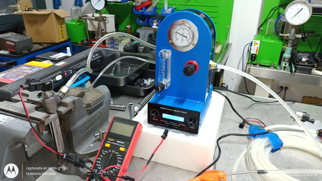 Inyector piezo continental, prueba flujo de retorno por aire, equipo de medición y activación.