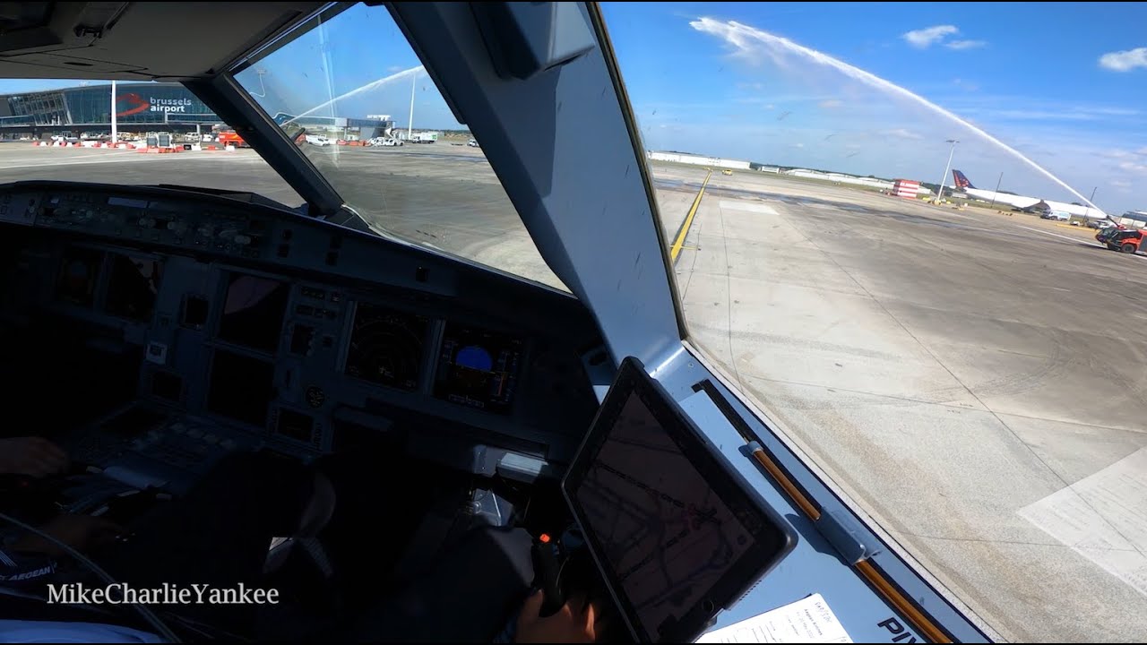 Airbus A320 take off from BRUSSELS with Water Cannon Salute (Cockpit View)