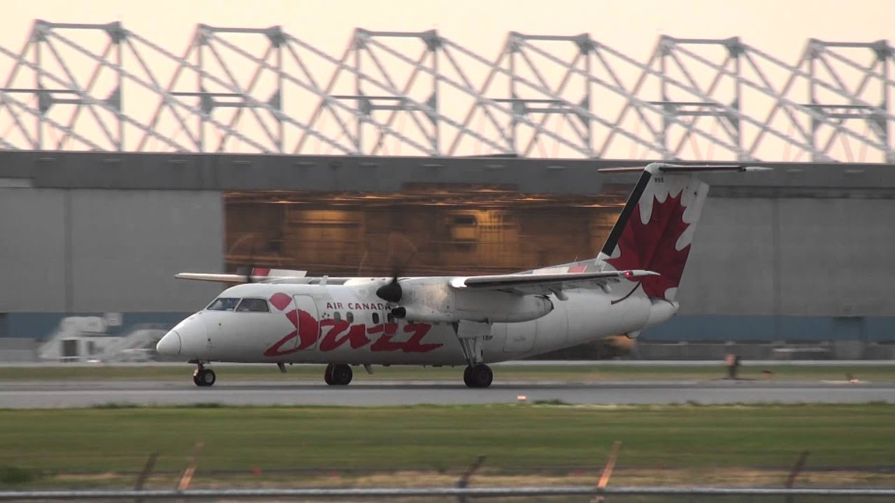 Air Canada Jazz Dash 8-100 Landing YUL Montreal
