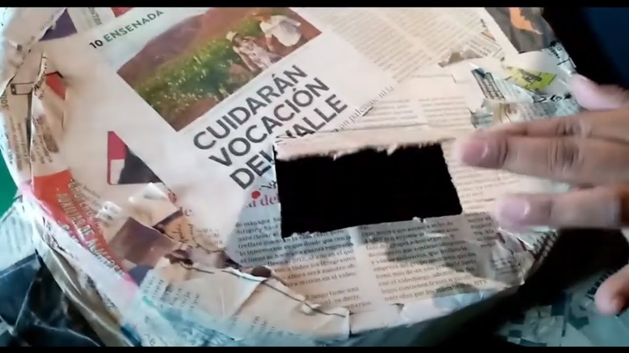 Como hacer el orificio a la piñata para los dulces