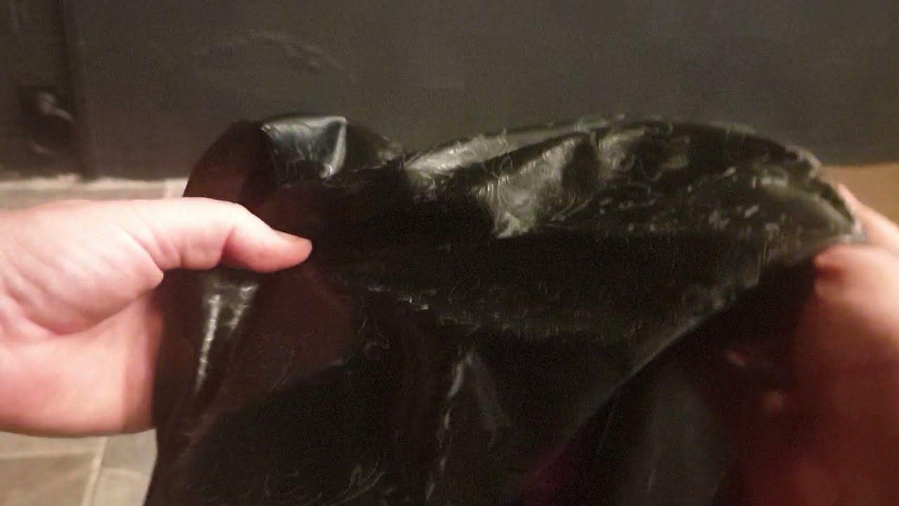 Latex Model opens her (belated) Christmas present