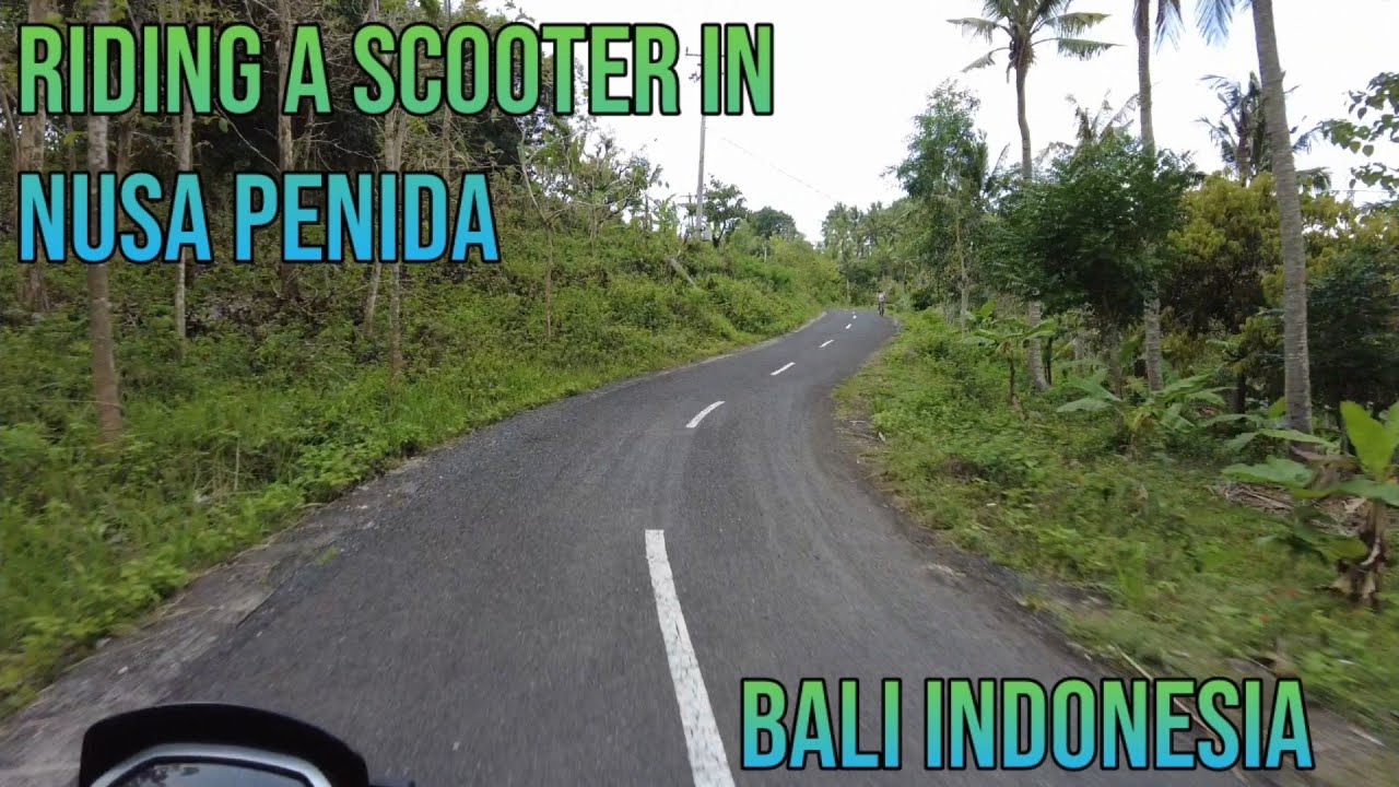 Nusa Penida BALI Indonesia Riding a scooter Cu scuterul in Nusa Penida