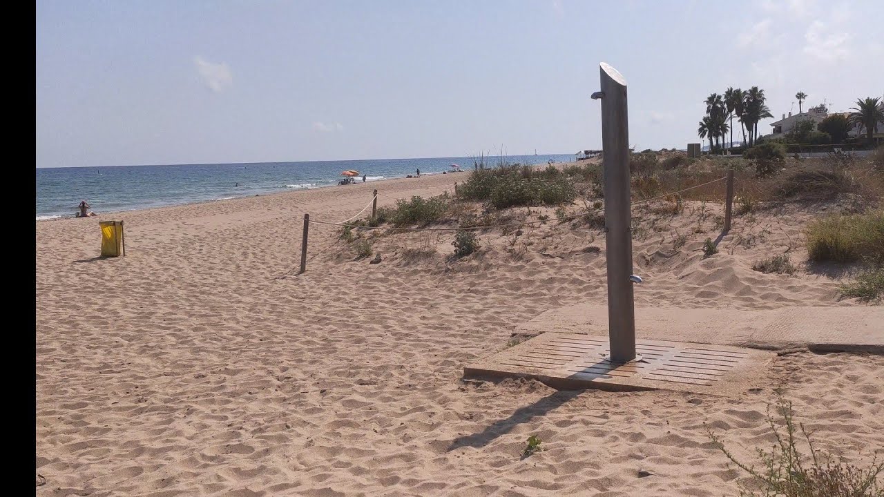 walk along the beach of calafell barcelona spain