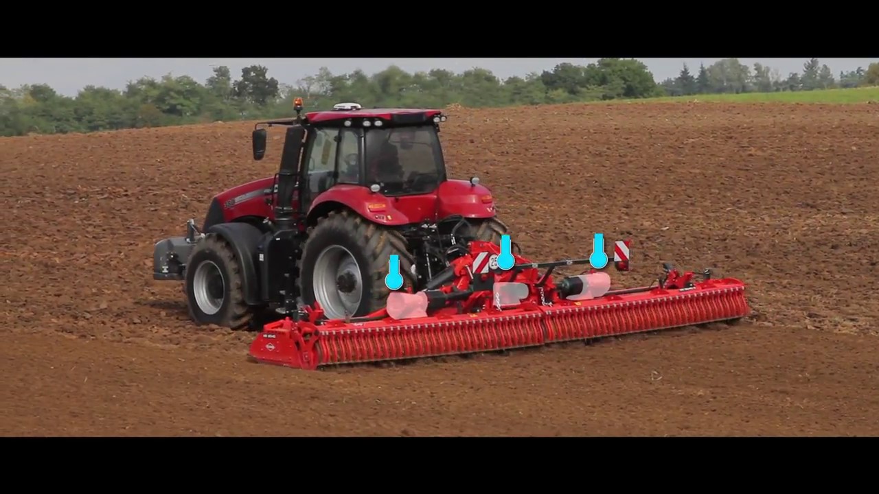 KUHN HR 1040 R  - Herse rotative grande largeur (en action)