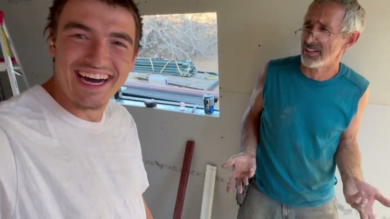 Georgi showing me how it is done to put drywall 😂