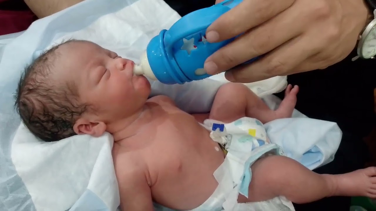 Cute baby first bottle feeding poor sucking 🍼💞