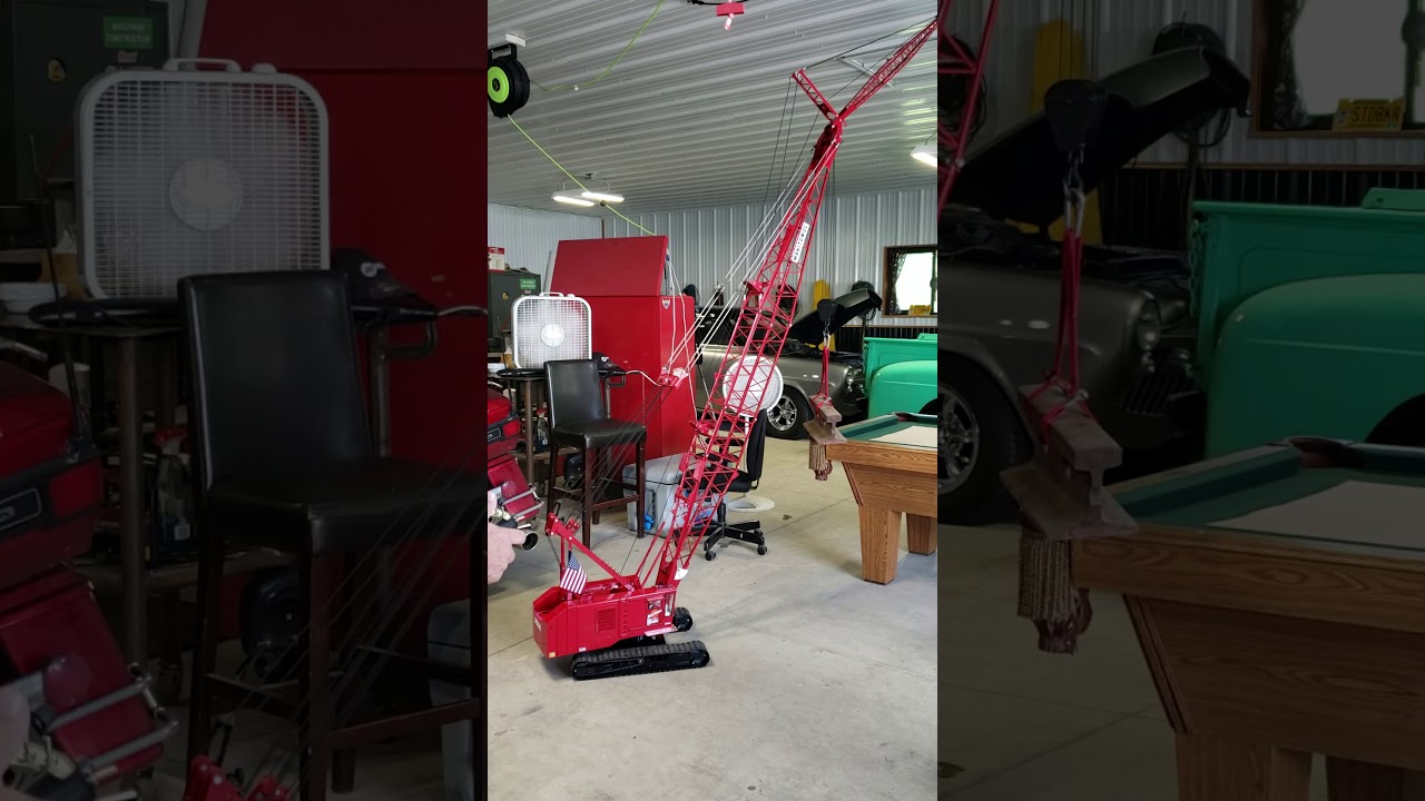 Manitowoc 4100 model crane Lifts Railroad Track Rail on Pool Table