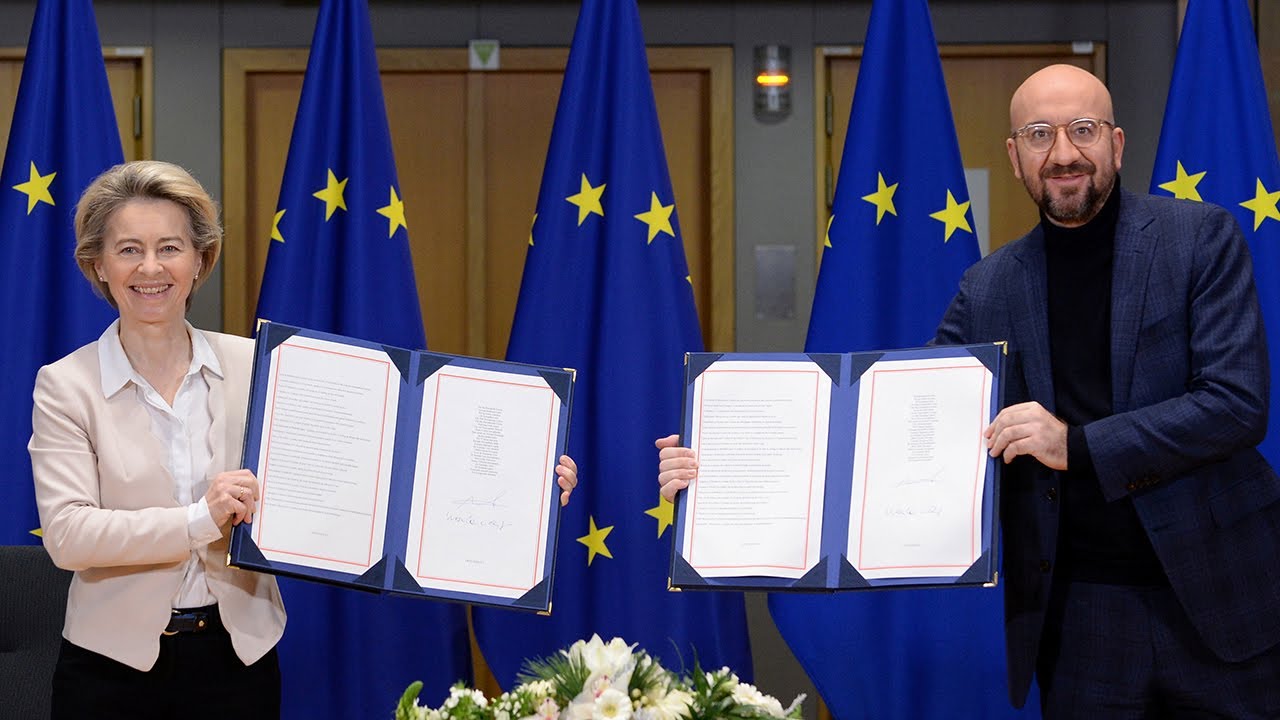 EU officials sign post-Brexit trade deal with UK