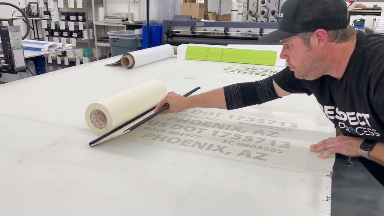 Applying application tape to cut vinyl