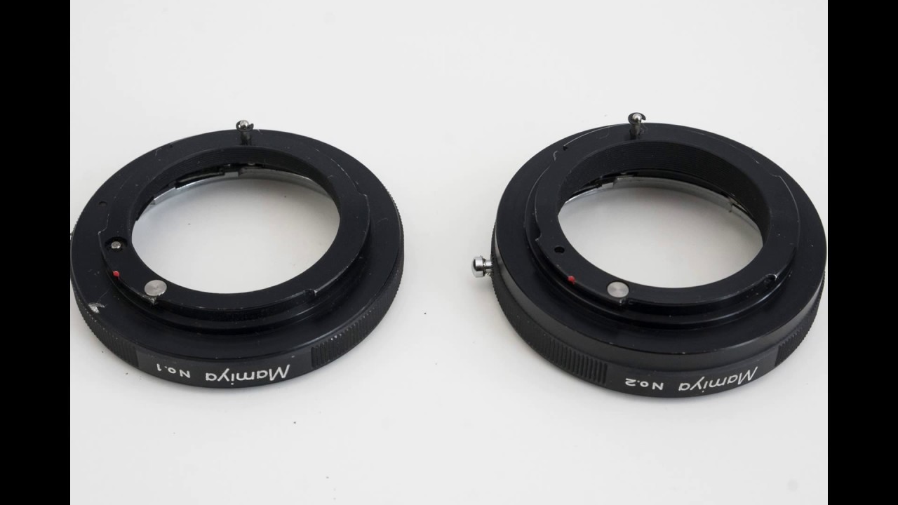Mamiya NC1000 35mm SLR film camera + Mamiya Sekor CS 28mm f/2.8 + 50mm f/2 + 200mm f/3.5 + rings