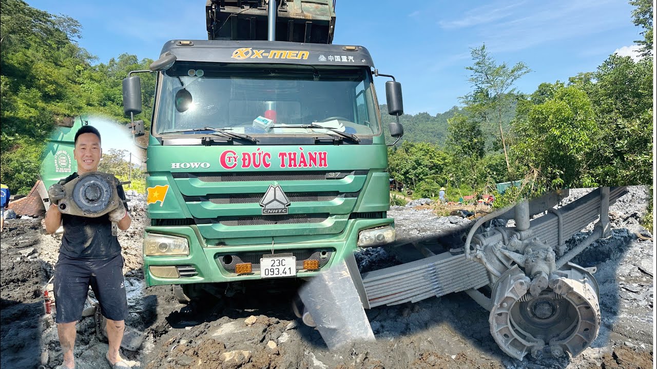 Rescue of a 3-axle dump truck carrying goods at a construction site with a broken front axle