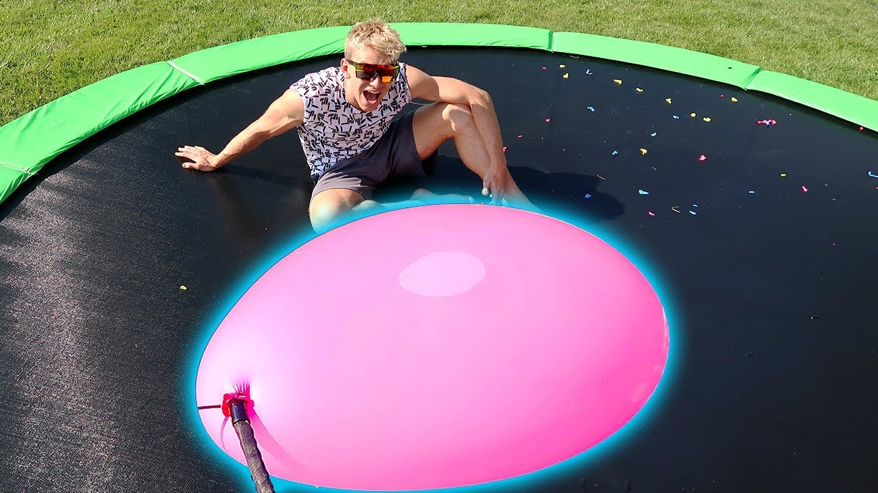 GIANT WATER BALLOON VS TRAMPOLINE!!