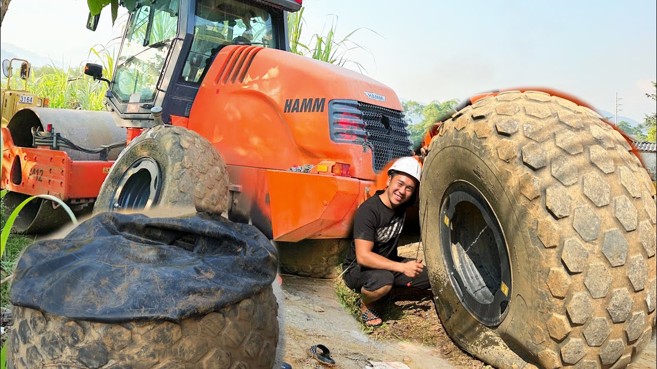 drive 200km to fix a HAMM roller tire at a construction site in 40 degree heat Giang repair car