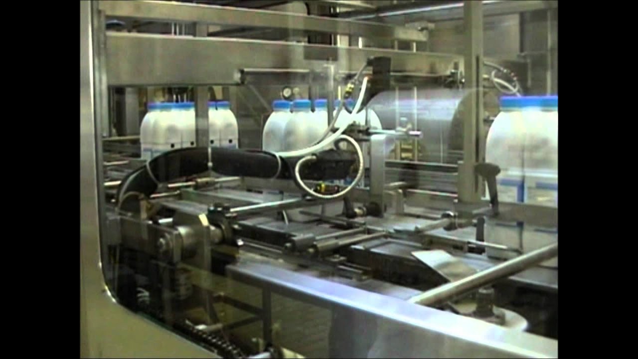 Fardeleuse Poly UC SA 2060 TL + VAC CREMO Polypack.wmv