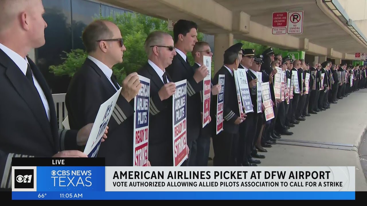 American Airlines pilots picket at DFW after voting to authorize strike
