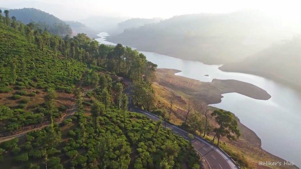 Drone shot of Sholayar Dam | rally of bikes #valparai #naturelovers #dji #sholayardam #bike #biker