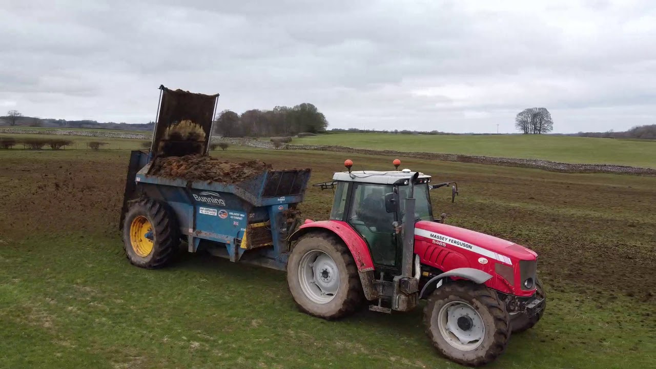 Massey 5465 With Bunning Spreading Muck