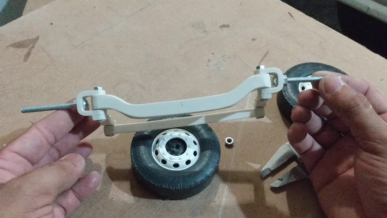 Conclusão do eixo direcional miniatura presente aos inscritos