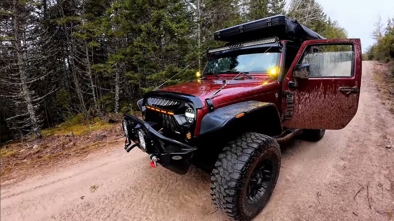 Off road Jeep Trails in Mud and Rain Leaving Camping Location