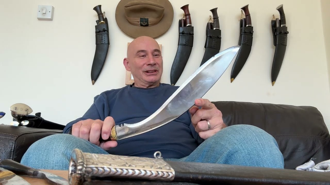 An excellent 35cm long bladed Kukri housed in a superbly silver decorated scabbard 👍