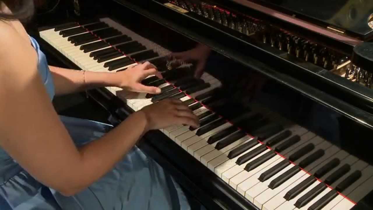 Katalin Zsubrits plays Debussy Arabesque No. 1.