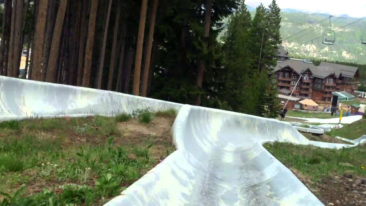 Chloe and Daddy ride the alpine slide