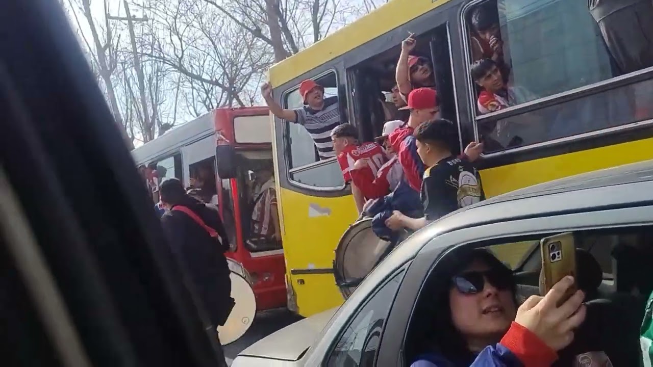 Partida de los micros rumbo al Centenario