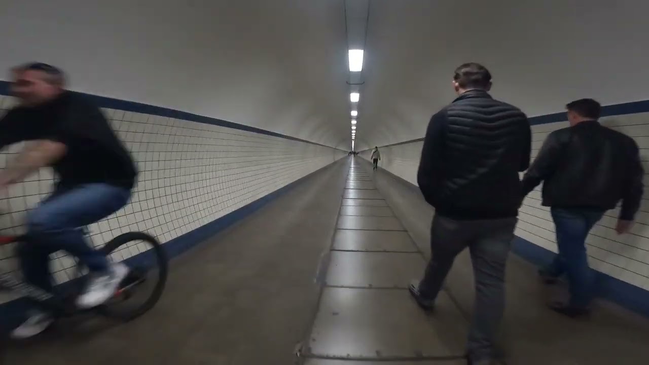 Cycling through the Sint Anna tunnel in Antwerp.